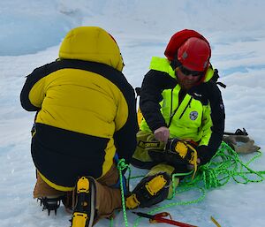 Two expeditioners prepare for a trip through a crevasse field to the Russian aircraft wreck near Mawson
