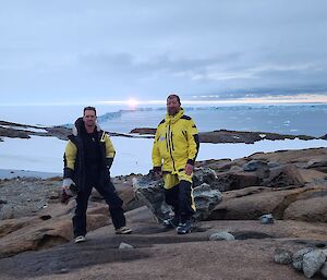 two expeditioners - Mick & Terry stand atop a moraine overlooking the Vanderford glacier at Casey station