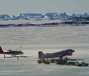 Twin Otter and Basler parked on Sea Ice outside Davis Station