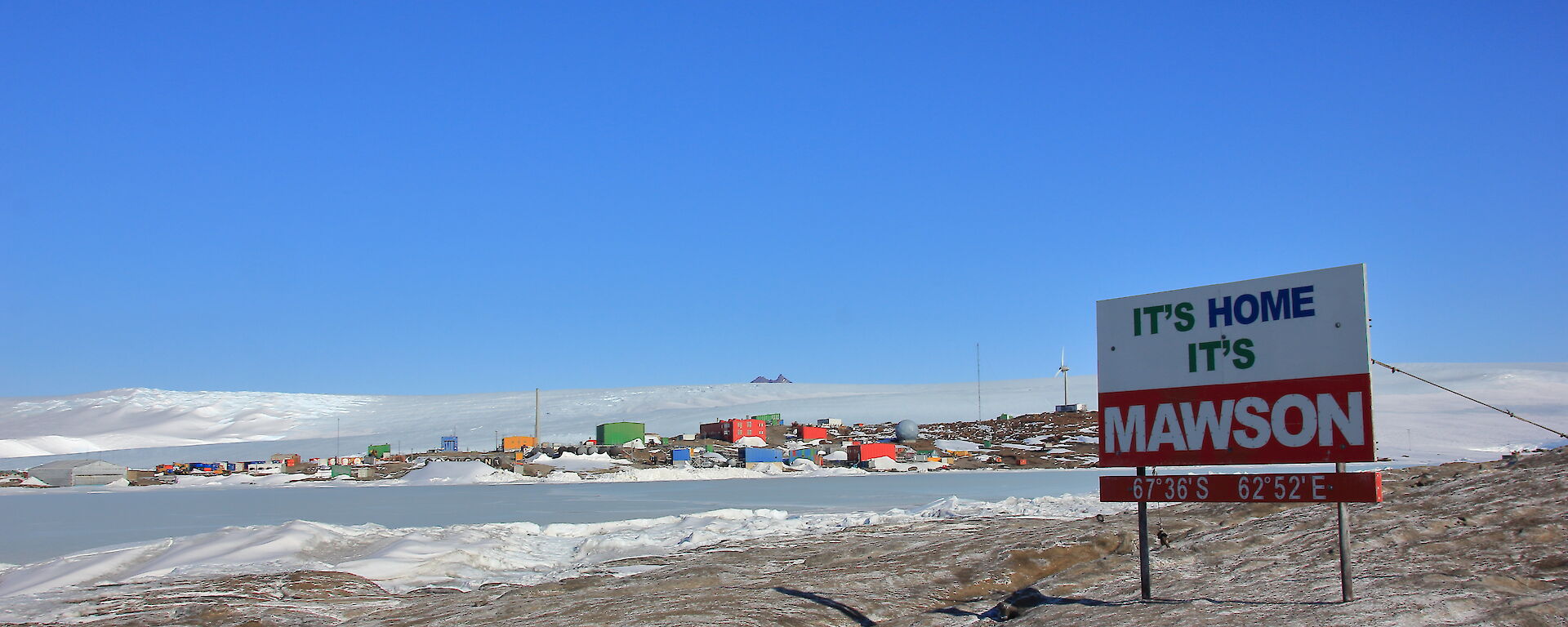 The welcome sign on West Arm states 'Its Home It's Mawson'