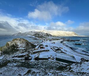Station buildings on the Macquarie Island isthmus, dusted in snow