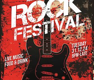 A red poster stating Rock Festival - advertising the station bands performance on New Years Eve to bring in the new year
