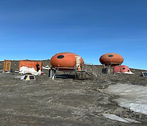 A mixture of different sized field huts on the north side of Bechervaise Island