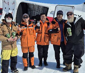 Three CHINARE scientist with two of the Mawson expedtioners outside the Xue Ying (Snow Eagle) GCX