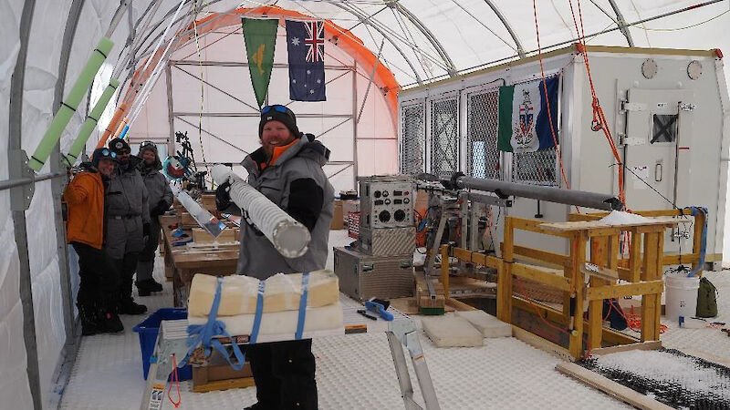 A man holding an ice core
