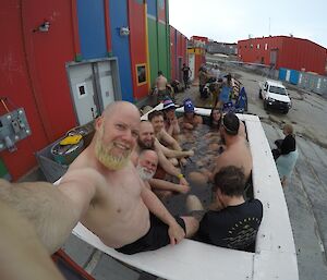 A selfie taken of a crowd in the spa after the summer swim