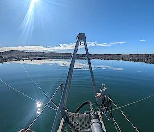 View of a body of water from a raised metal platform