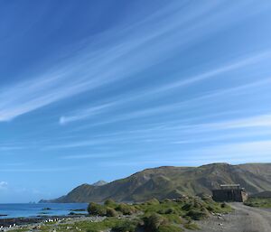 Very high white streaks of cloud over the island