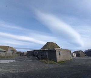 Station buildings with rectangle-shaped clouds above