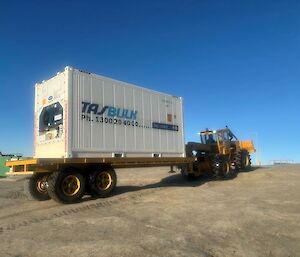 Shipping container on the back of a truck