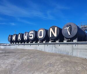 Fuel storage tanks with letters on the front, spell out MAWSON