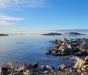 A coastal view – water lapping on a rocky shore
