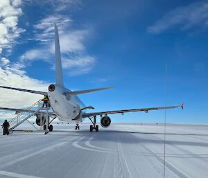 Image of A319 aircraft stopped on ice runway.