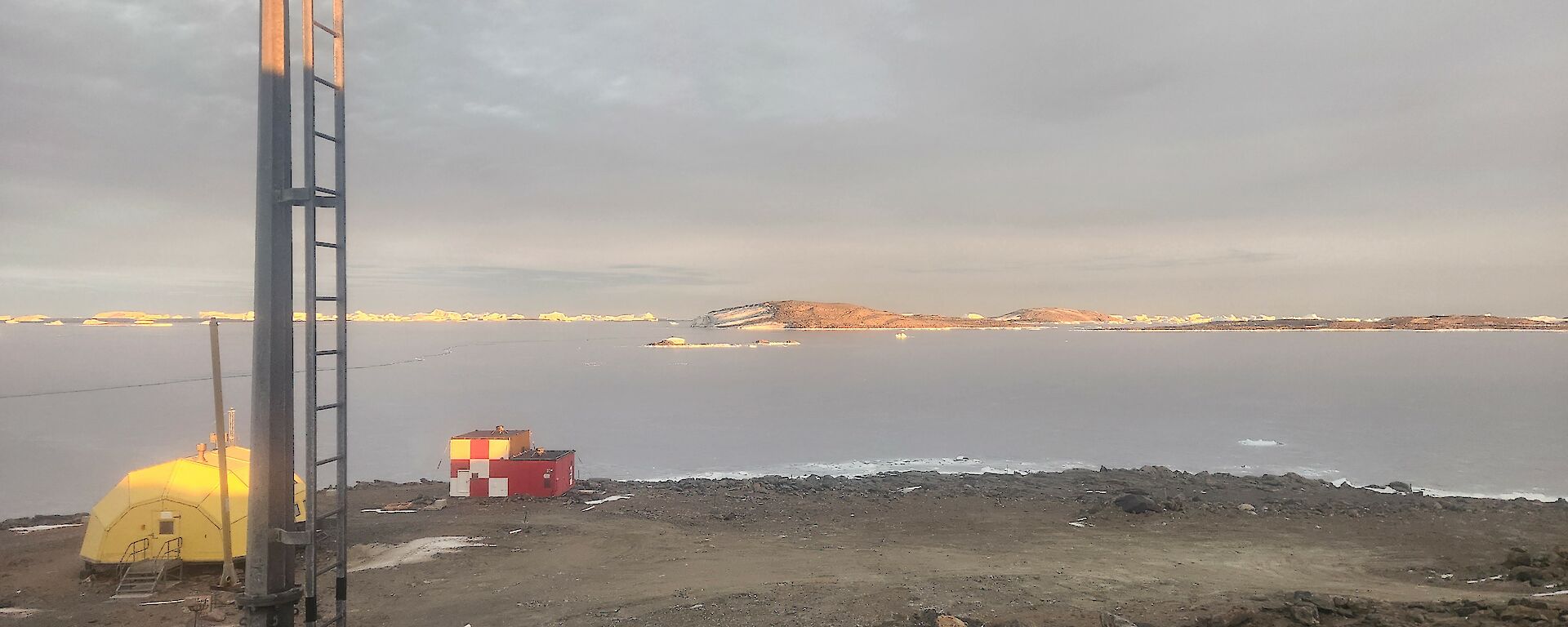 Davis station in the foreground, with sea ice in the background