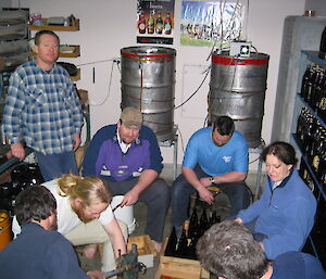 Expeditioners making home brew in 2003