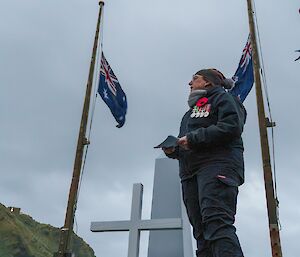 Station Leader Rebecca Jeffcoat wearing medals gives the ANZAC Day address