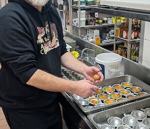 A man helping in the kitchen