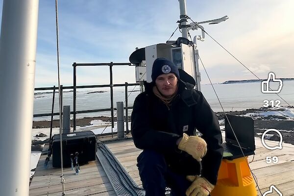 Expeditioner in Antarctica with text on image reading “then I highly recommend you apply”