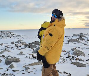 The author standing in the field amongst ice and rocks