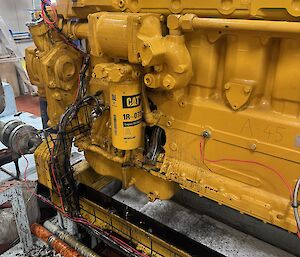 A broken engine with a hole in the side
