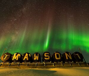 Green streaky sky over the MAWSON sign
