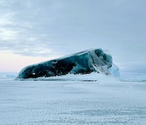 A jade iceberg surrounded by ice