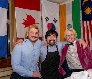 Three men dressed up for dinner.