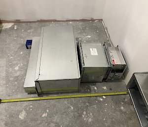 air conditioning ducting laying on the floor