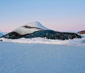 A jade ice berg in the snow