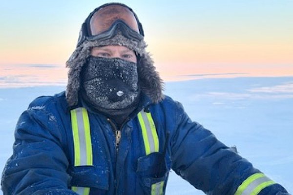 An expeditioner in the snow at Wilkins aerodrome