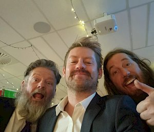 Three Casey trades expeditioners smiling