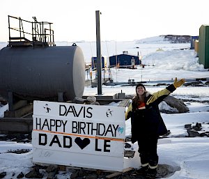person standing in front of sign