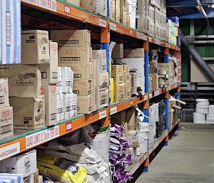 Shelves stocked with bags and boxes of food