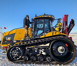 The author standing on his machine dozer