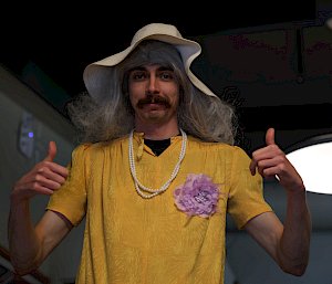 man wearing dress posing for the camera