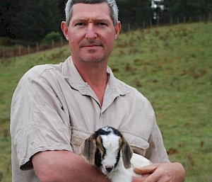 man holding animal in hands