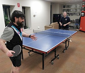 Two expeditioners playing table tennis