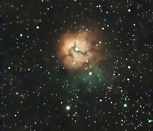 A bright, dusty brown-orange nebula