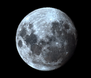 Detailed photo of the moon showing its craters and other surface features