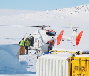 A helicopter on the ground at Casey Station