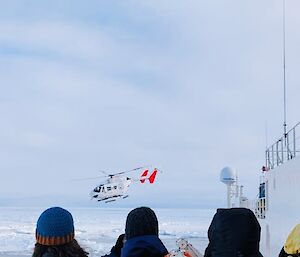 Helicopter taking off from the RSV Nuyina