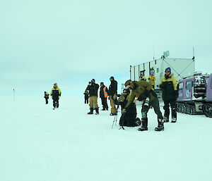 Expeditioners getting cameras ready for the airdrop