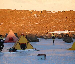 Two polar pyramid tents pitched on ice