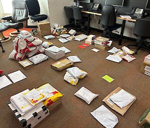 Mail sorted and sitting on the floor of the library