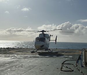 A helicopter on a ship's helicopter deck