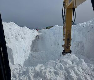 Dozer clearing snow down in Wharf Road