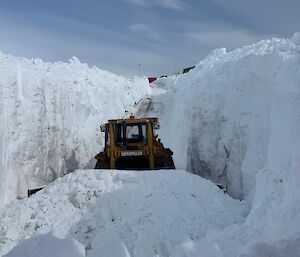 Dozer clearing snow down in Wharf Road