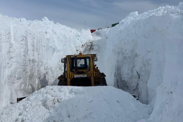 Dozer clearing snow down in Wharf Road