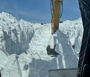 Dozer clearing snow down in Wharf Road
