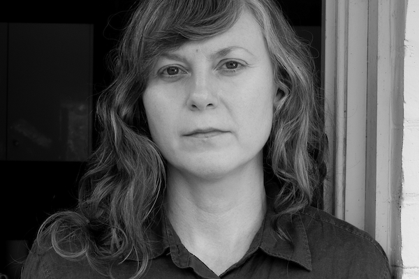 Woman standing in doorway